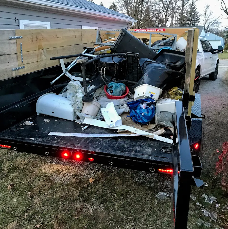 Roll-off dumpster delivered to a residential driveway in Price